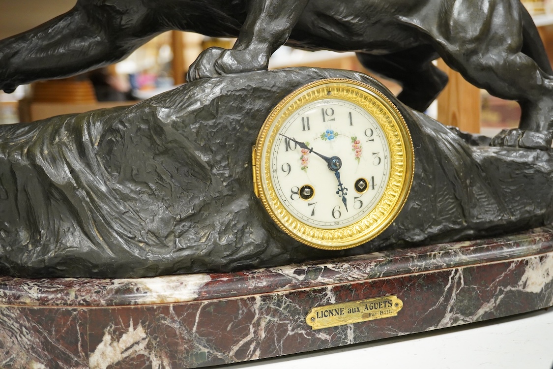 A clock garniture signed Boffil, ‘Lionne aux Agnets’